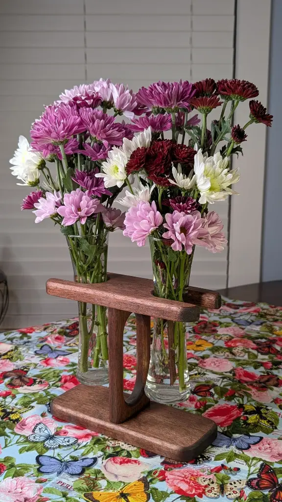 Two of a Kind Sabrina Red Mahogany with fresh flowers.webp